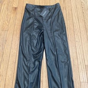 Pretty little thing Faux leather seam detail split hem trousers